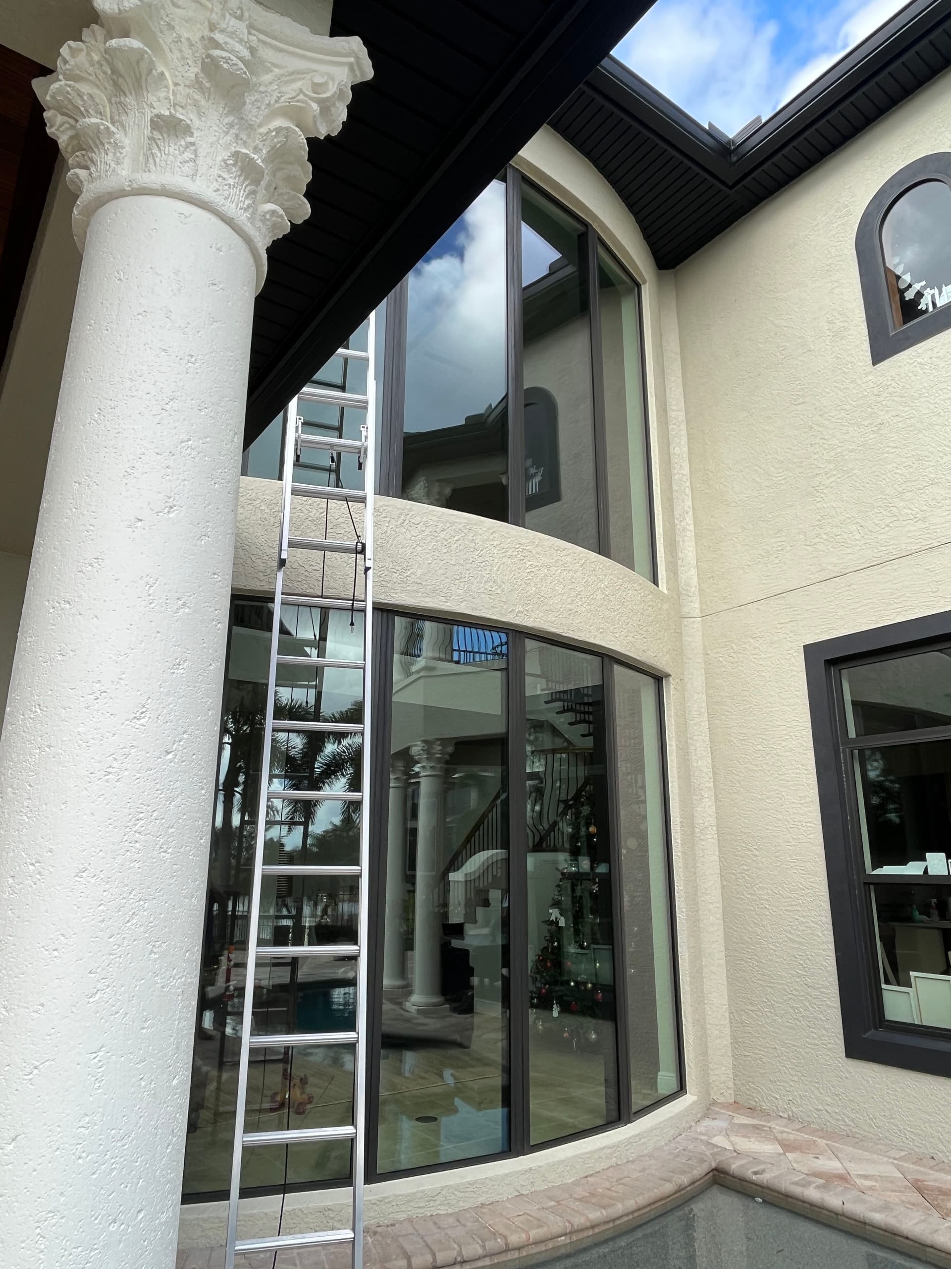 Gallery photos for Post-Installation Window Cleaning on High-Access Glass in Viera: Image #1